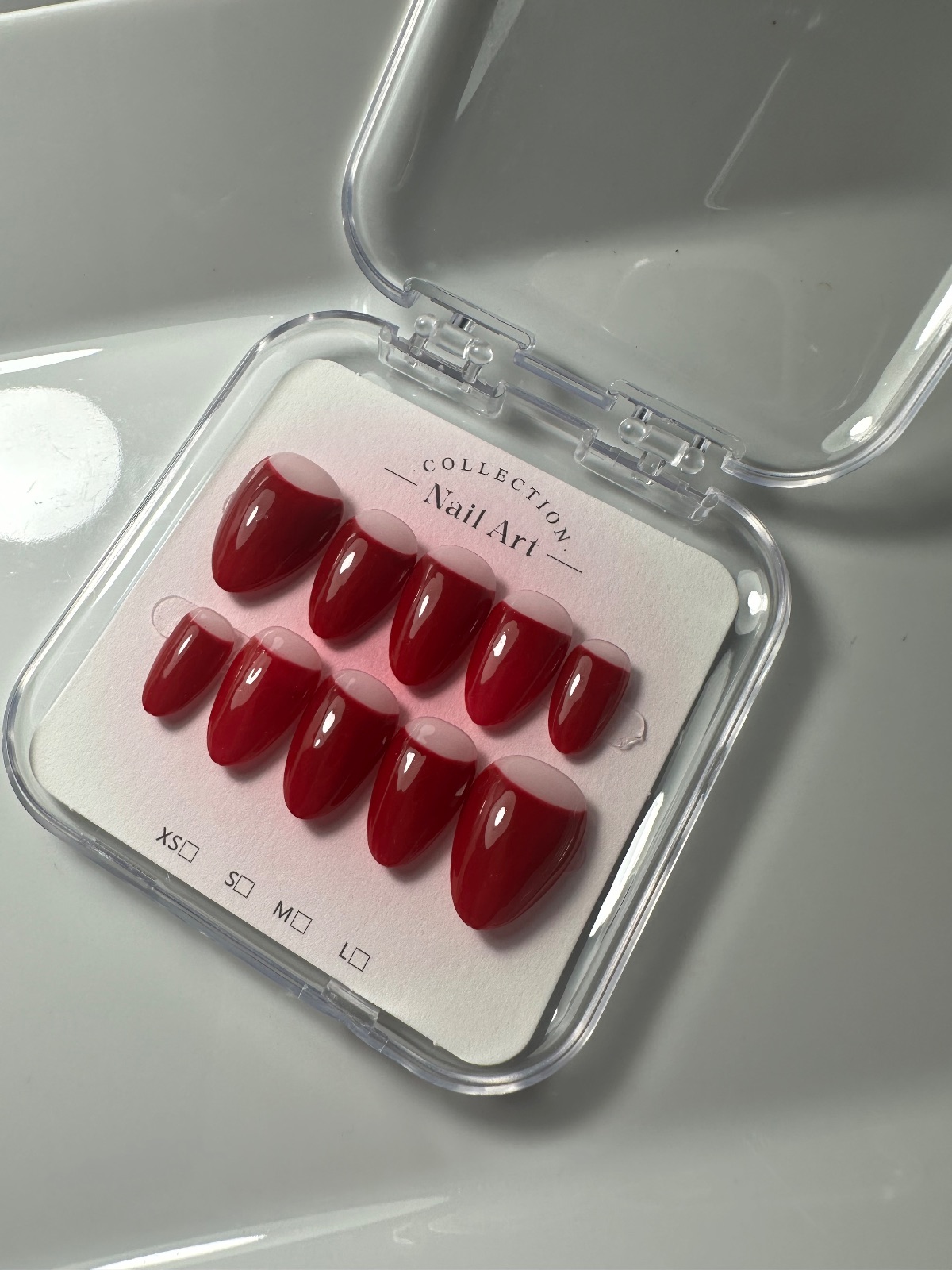 Hand-painted press-on nails in an almond shape, Retro red design, photo 3