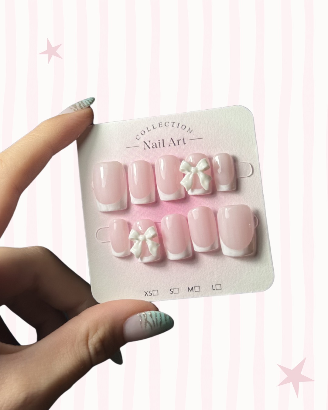 Hand-painted press-on nails in a square shape, Classic white French with a bow design
